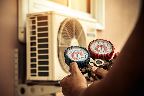 Professional Air Conditioning Service technician working in Scottsville, KY